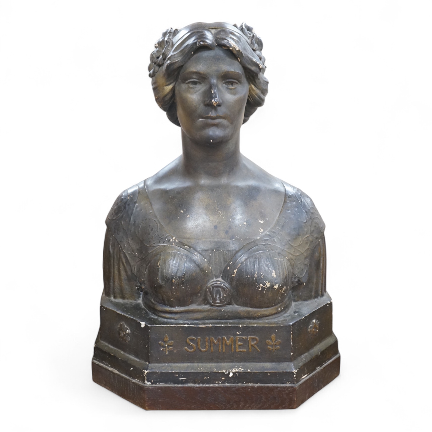 An early 20th century bronzed plaster bust 
